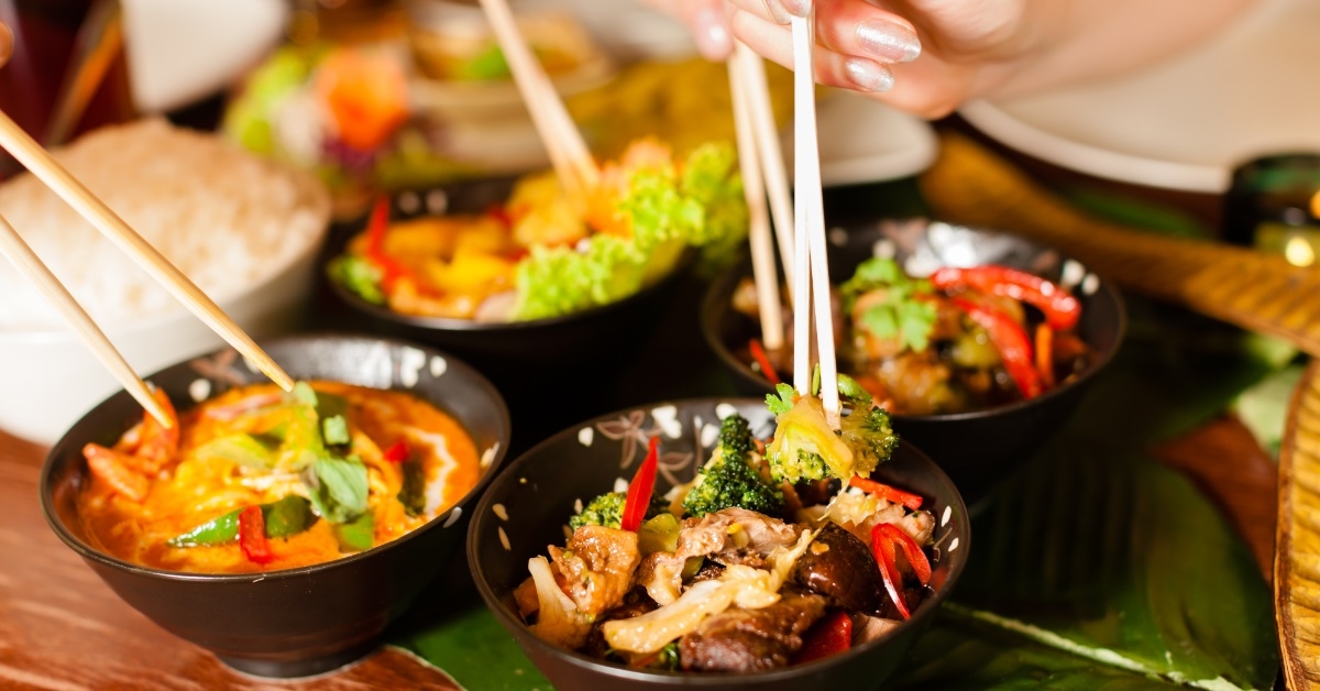 friends eating at thai restaurant