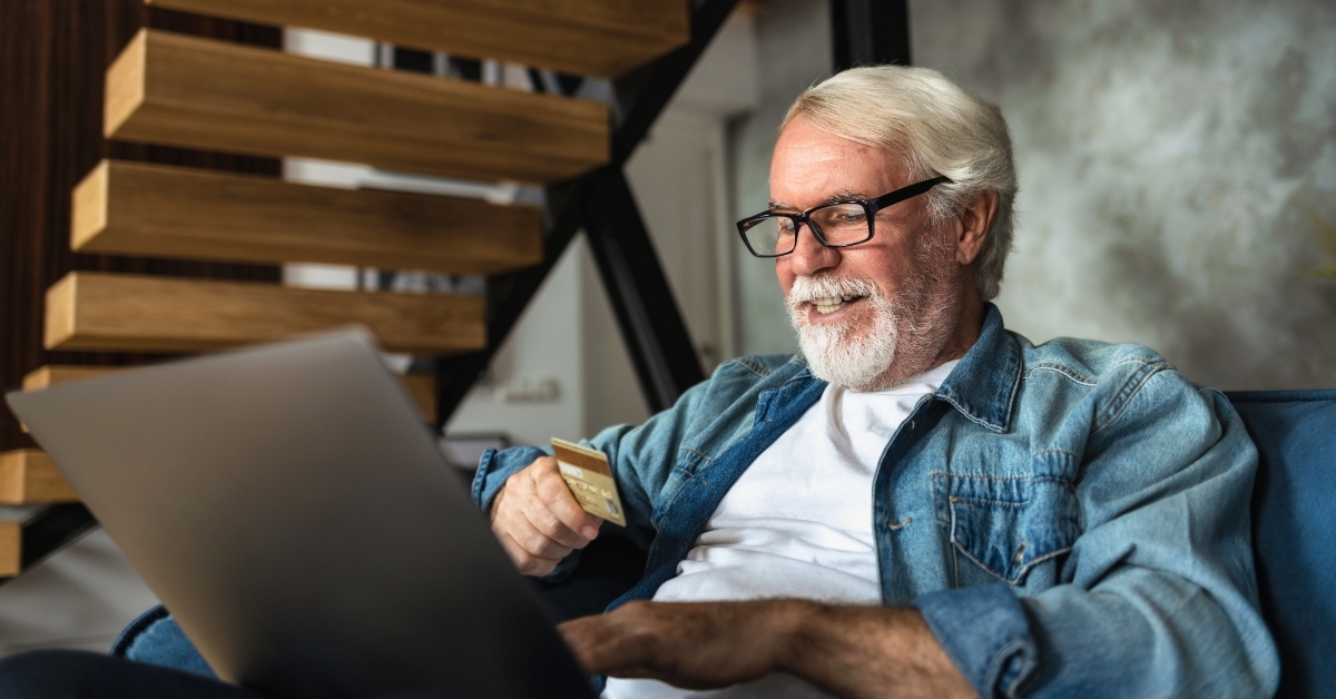 retired man shopping online