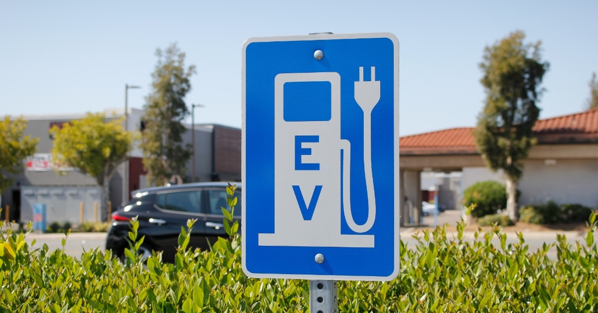 electric vehicle charging sign outdoors