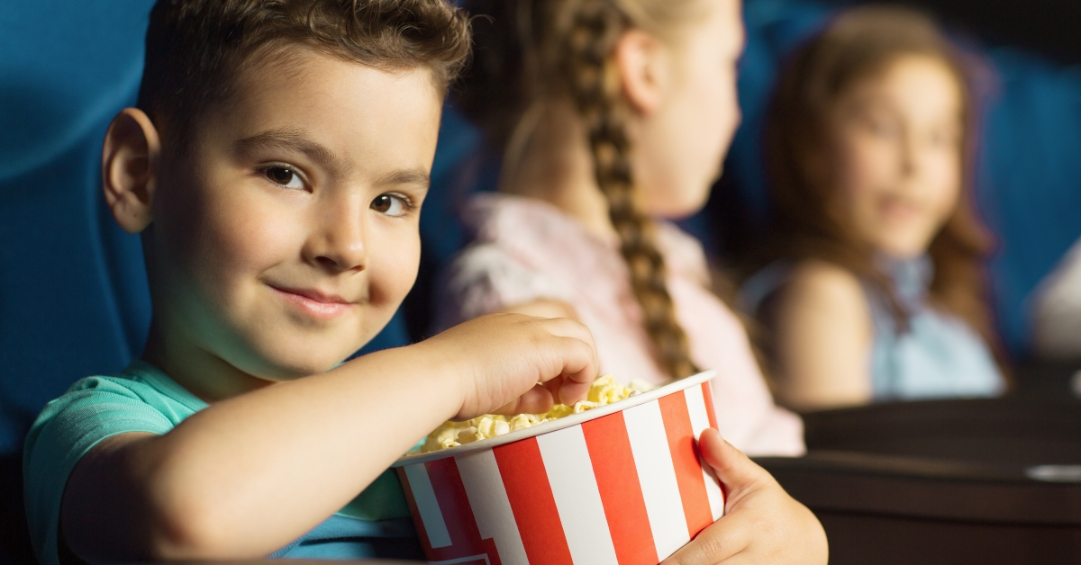 kids enjoying a movie at the cinema