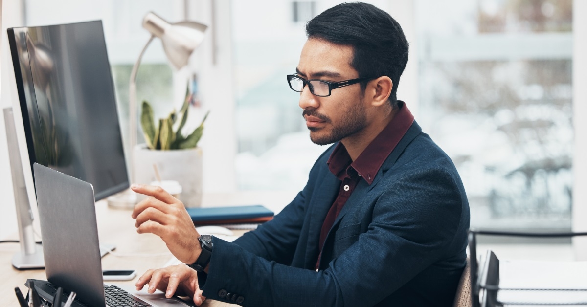 male accountant doing work at office