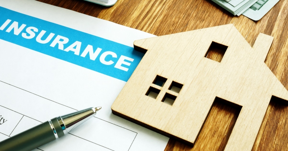house insurance form at table