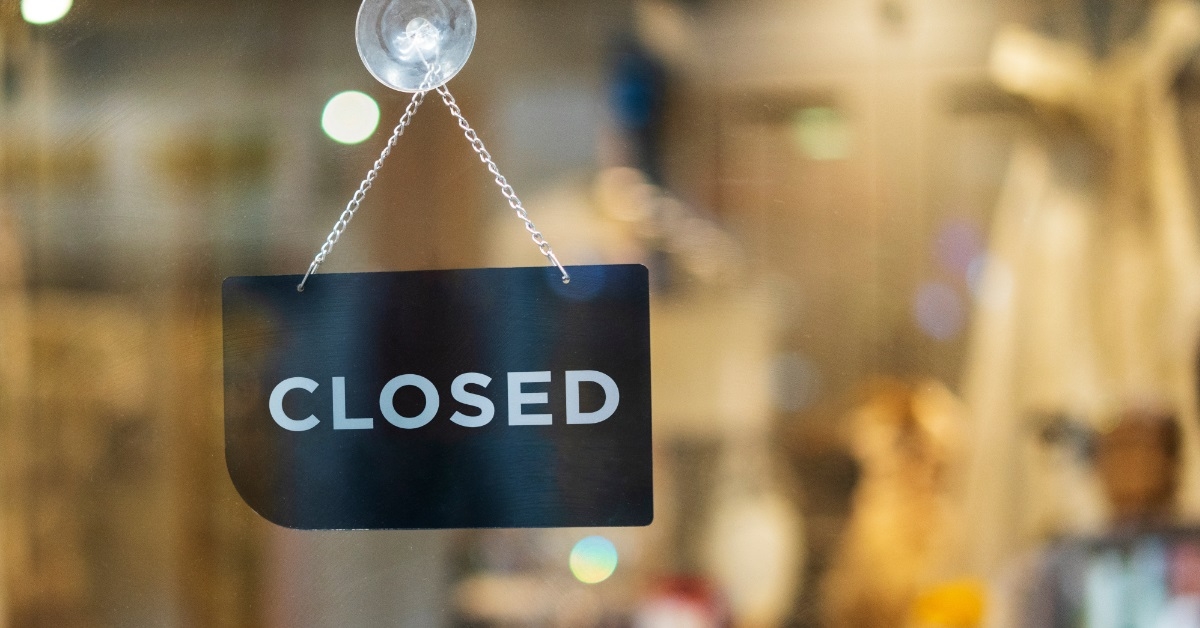 close signboard hanging outside Store
