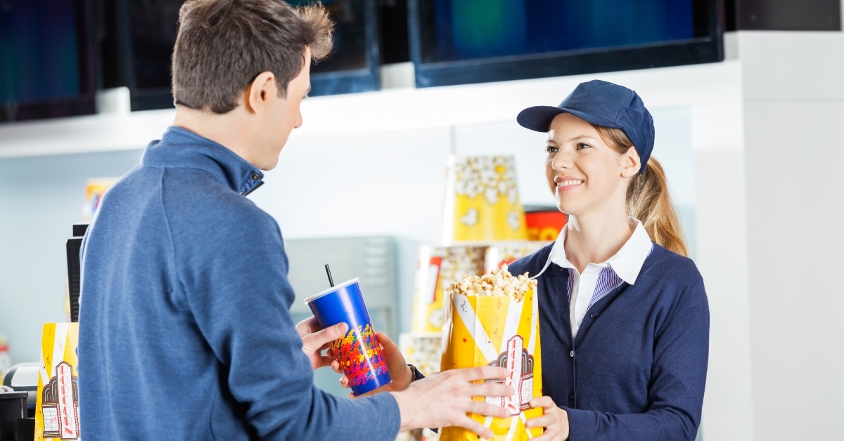seller giving popcorn