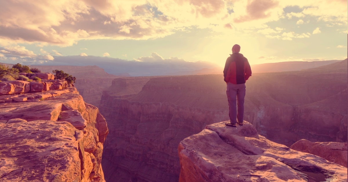 man hiking grand canyon