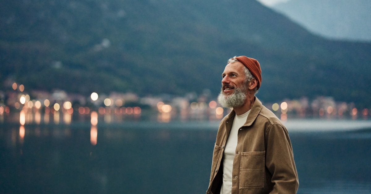 senior male admiring national park landscape