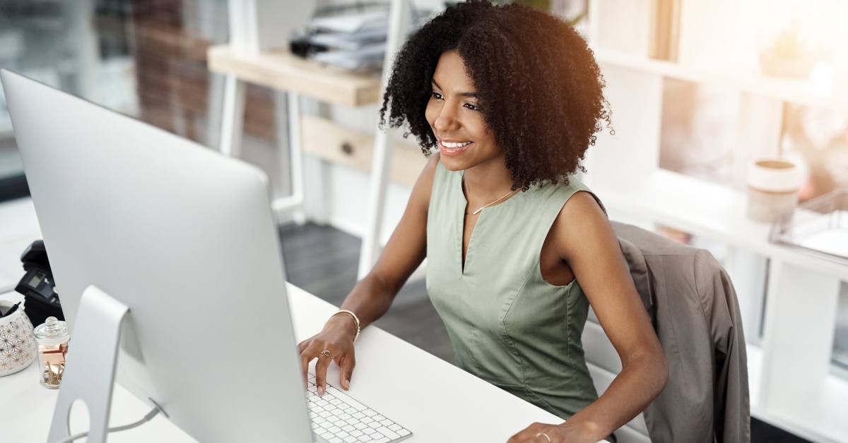 happy woman on computer