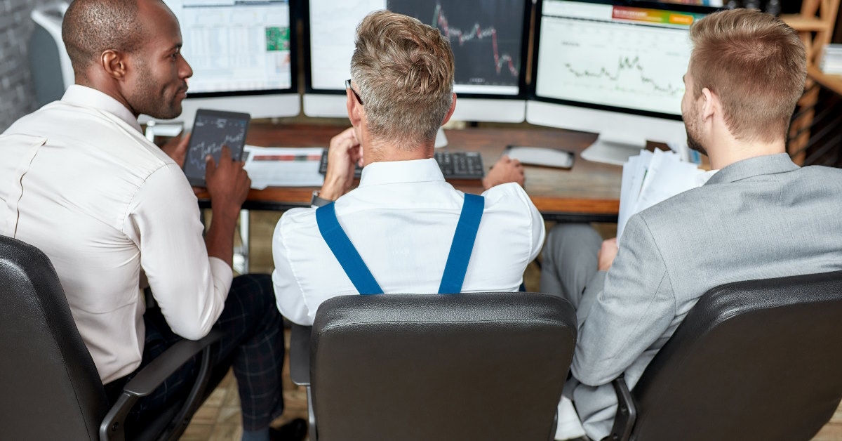 multi ethnic stockists working in office