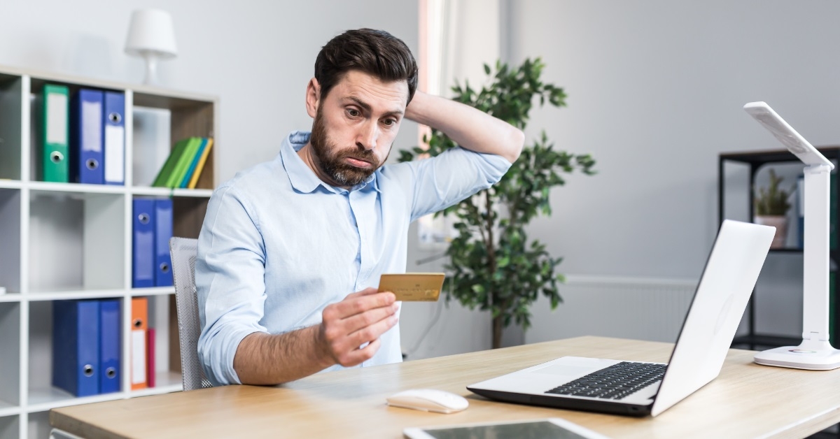 businessman holding Card at work