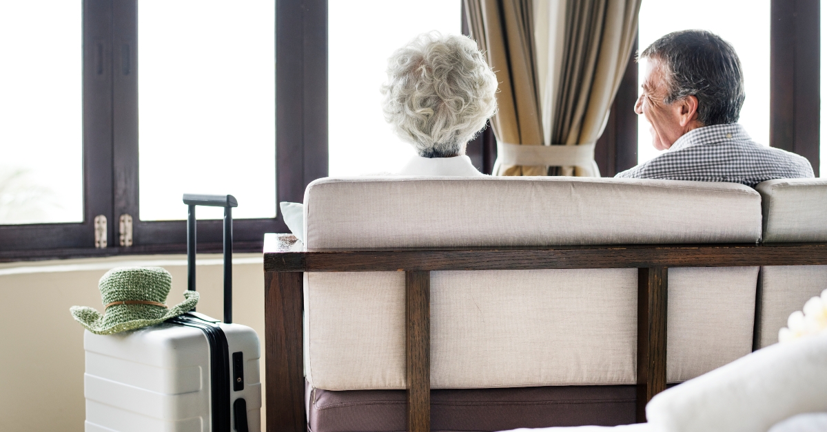 couple sitting in a hotel room