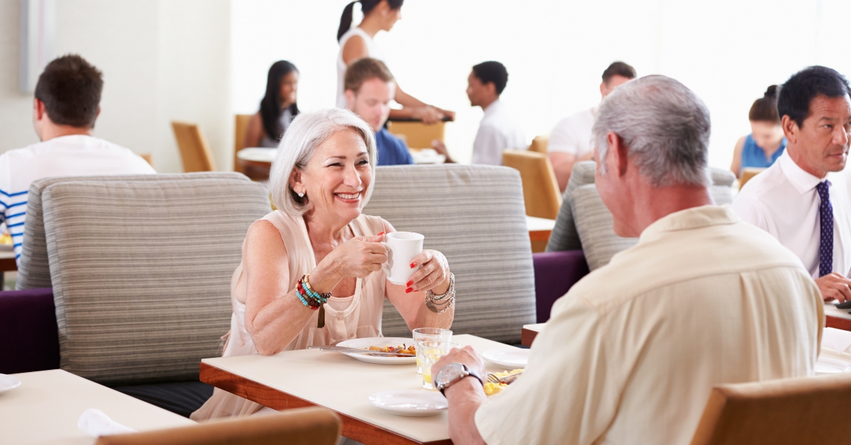 senior couple enjoying breakfast