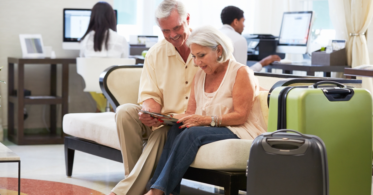 senior couple in hotel lobby