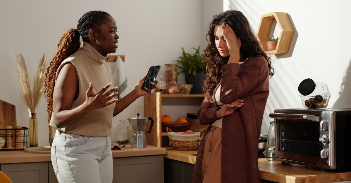 irritated woman with smartphone