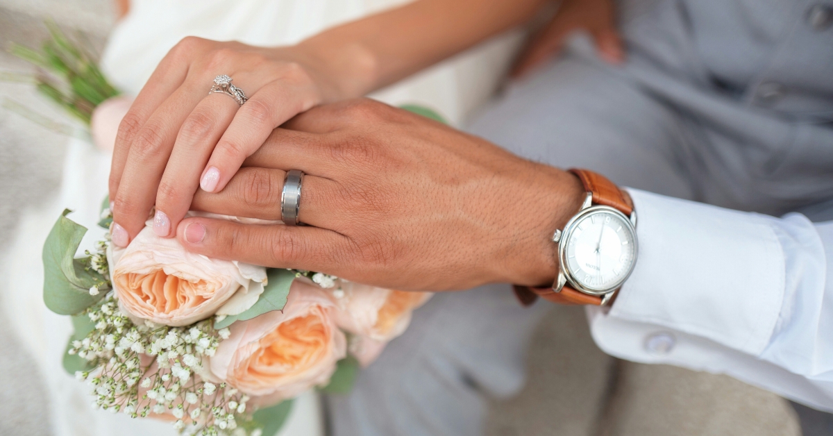 man and woman holding hands