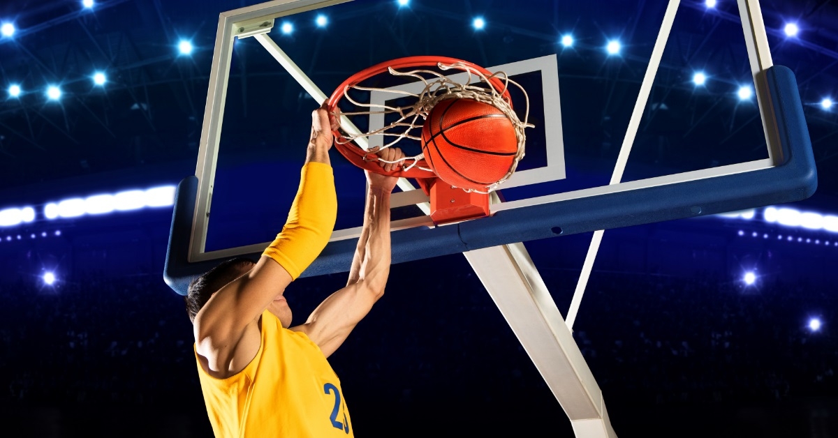 number 23 basketball player dunking ball