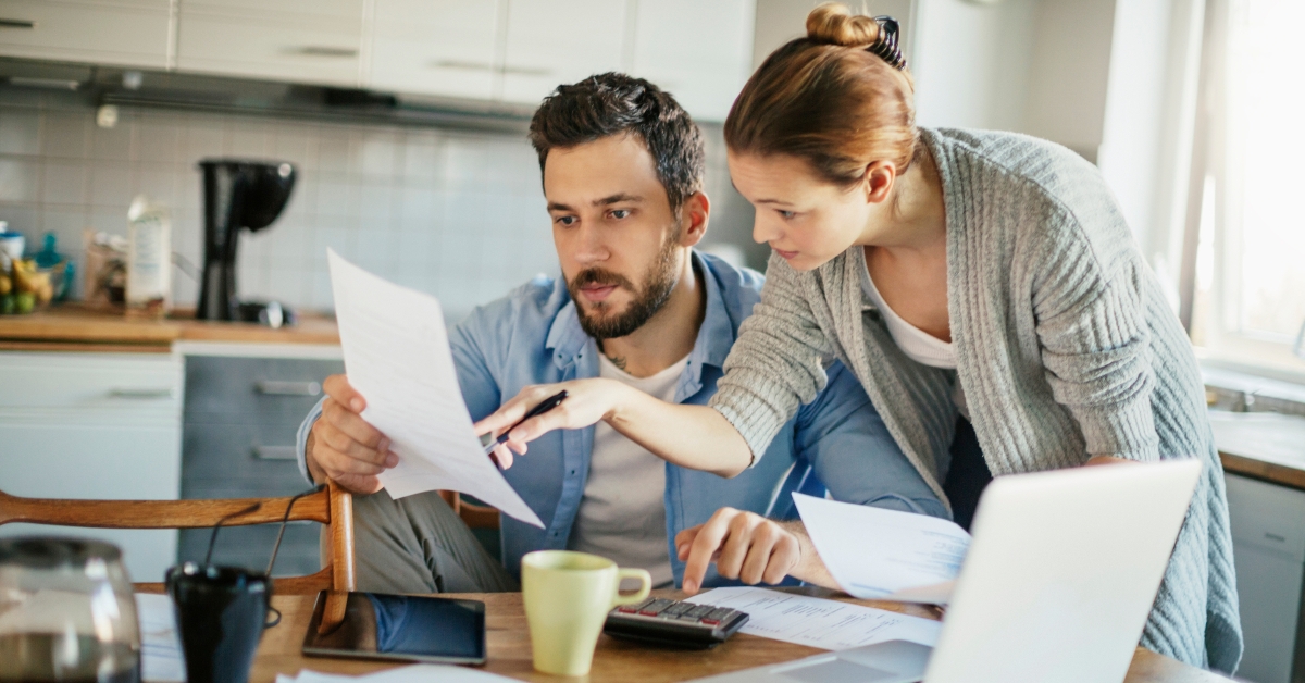 young couple going over bills