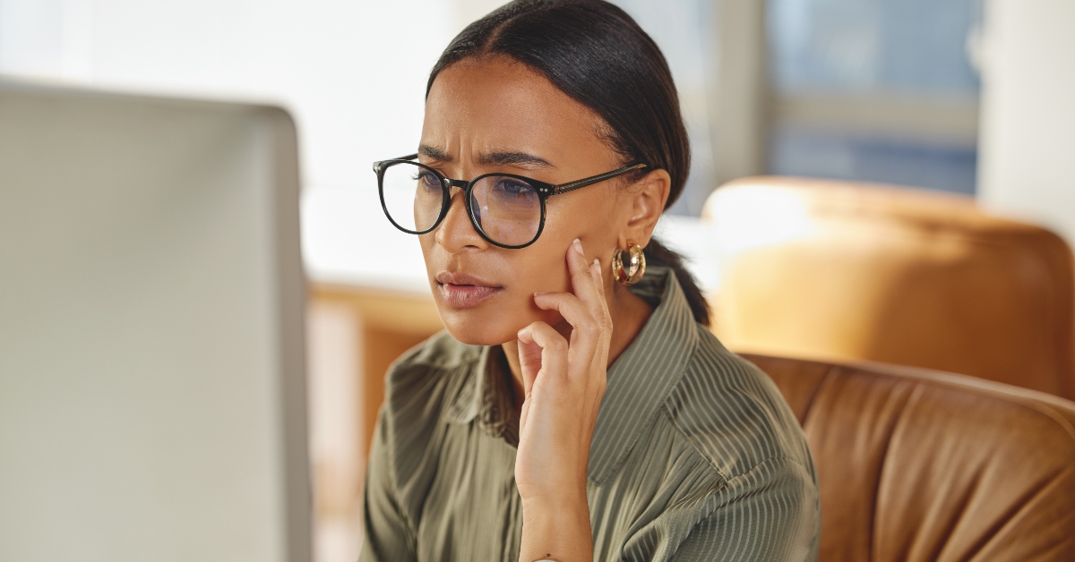 businesswoman looking confused while working