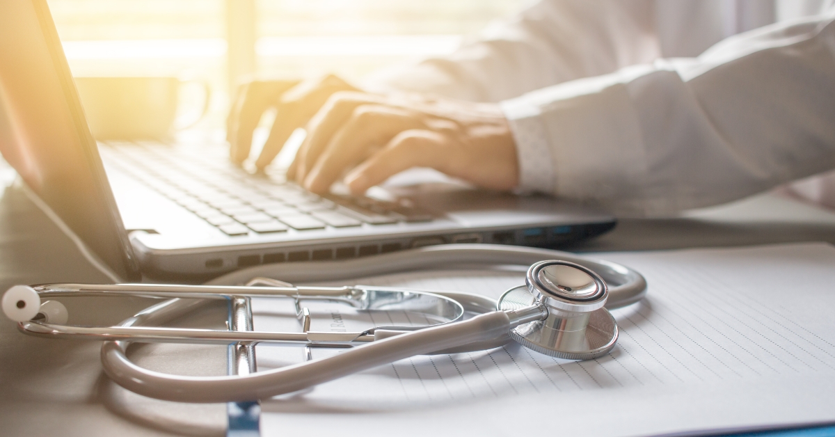 doctor working in laptop