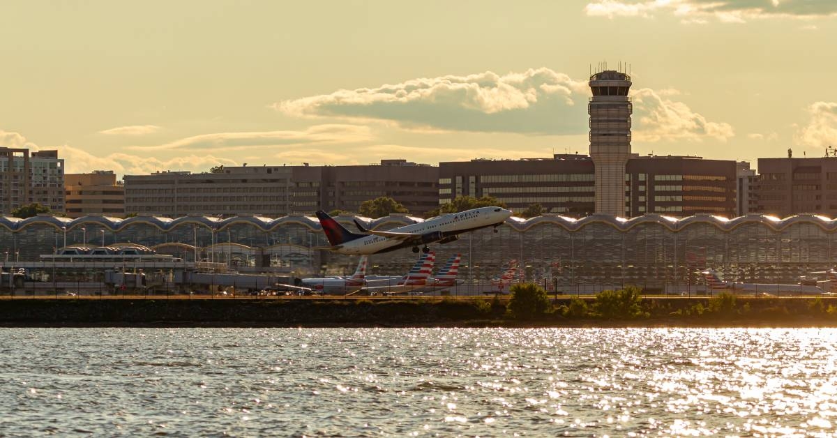 Panoramic view of Ronald Reagan National Airport across Potomac River at sunset