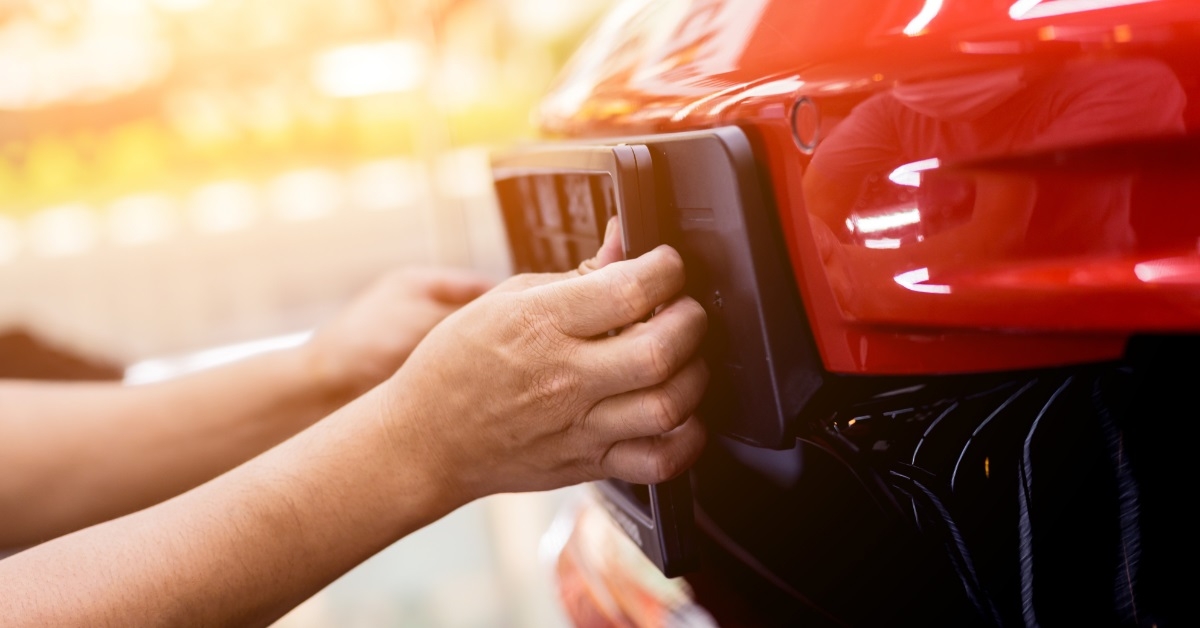 technician changing car plate number