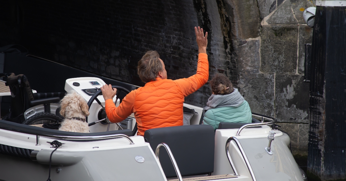 saluting friends during the cruising