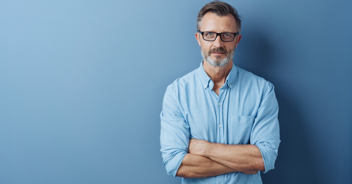authoritative man with folded arms