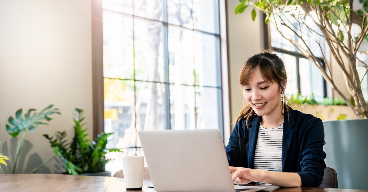 asian woman working from home