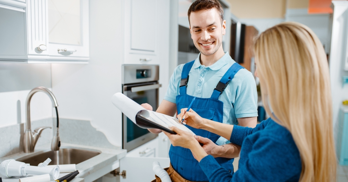 male plumber and female customer