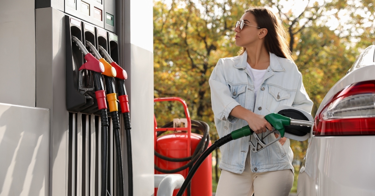 woman refueling car