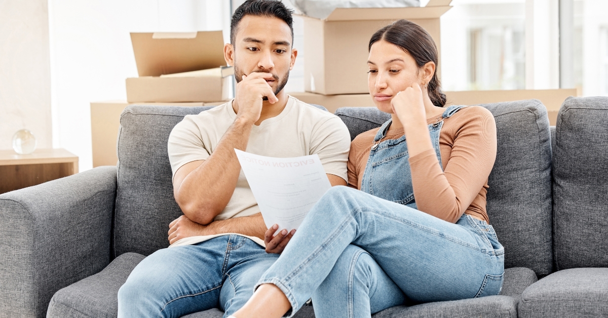 couple with note from bank
