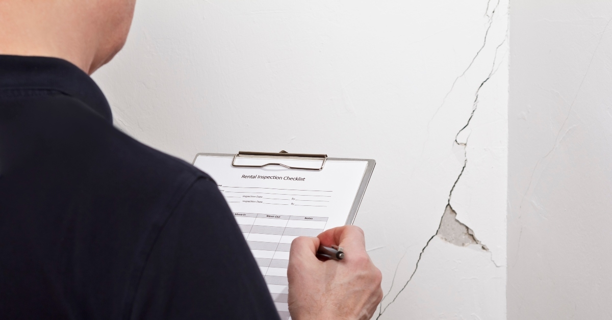man with inspection checklist