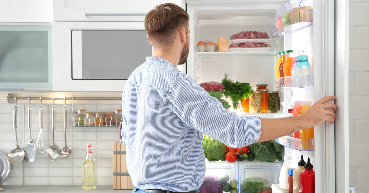 choosing food from refrigerator