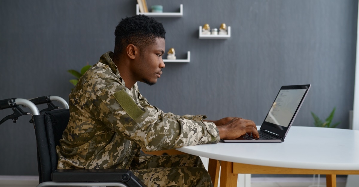 disabled military man using laptop