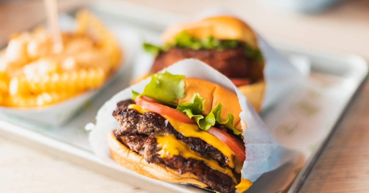 double cheeseburger with tomato and onion