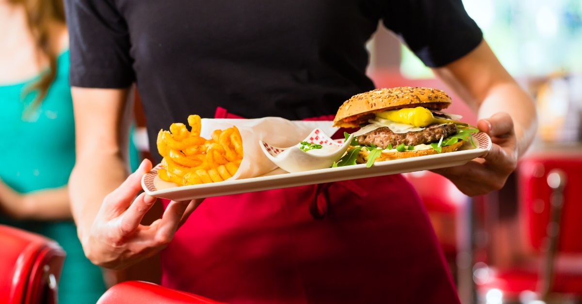 Waitress serving in American restaurant
