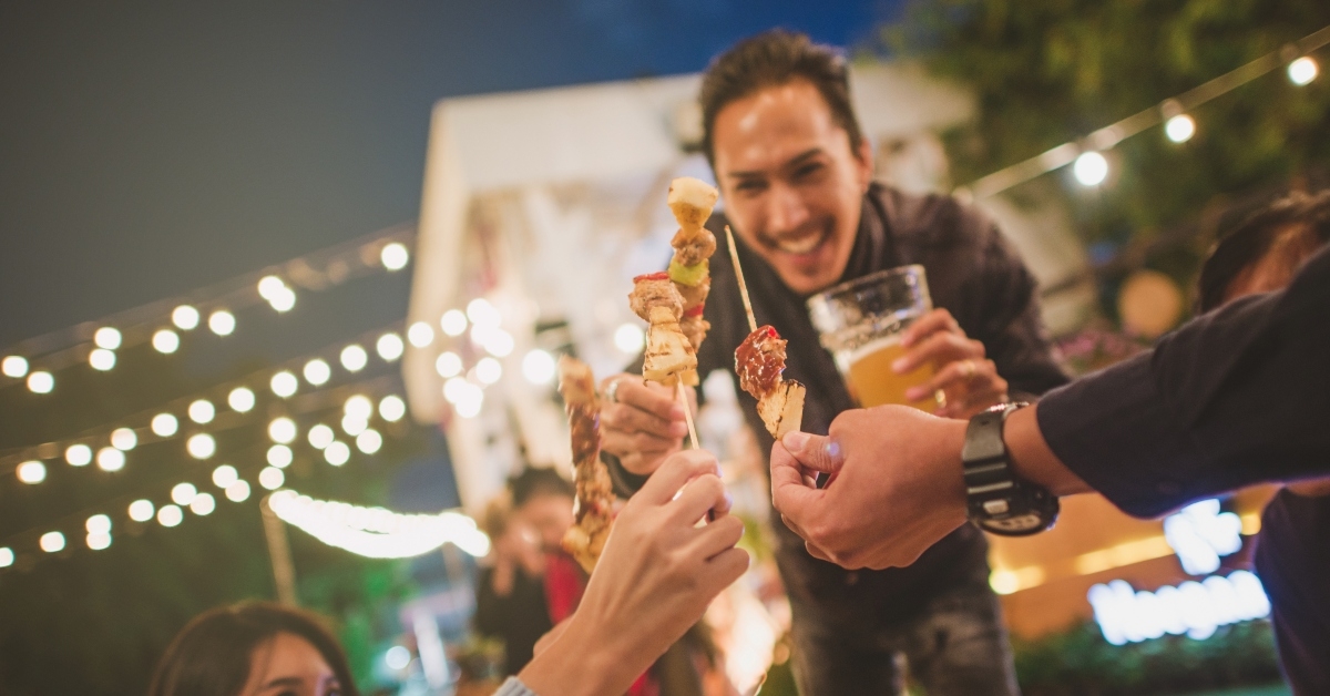 drinking beer at bbq party