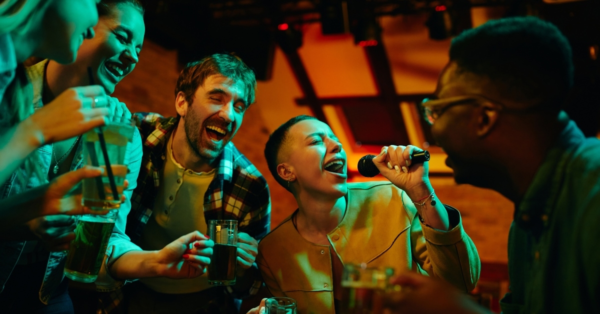 having fun while singing karaoke