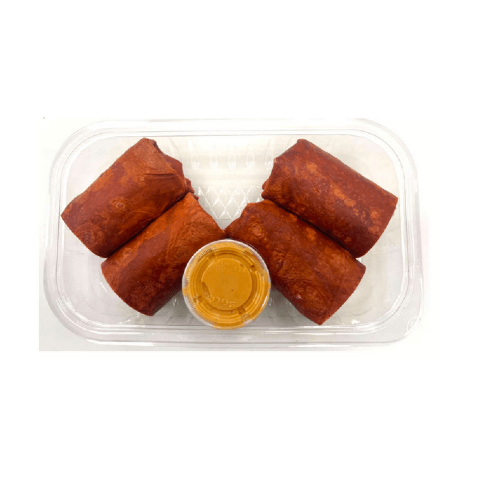 Four southwest chicken wraps with sauce in round container the middle