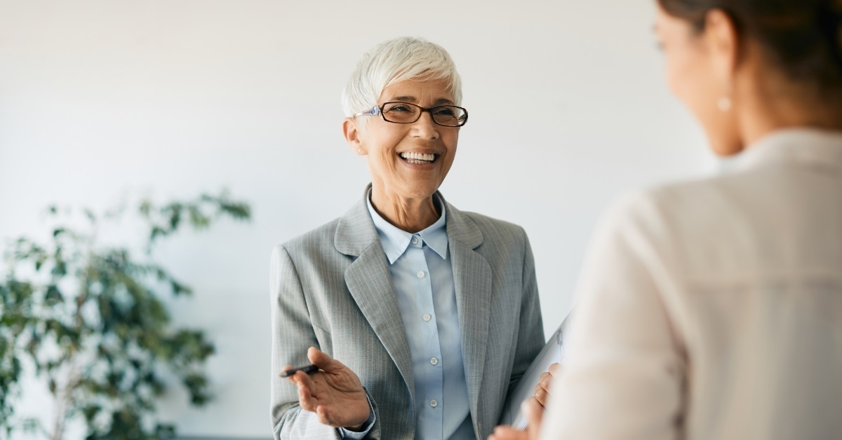 financial advisor talking to female client