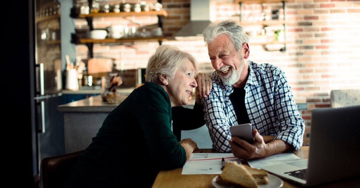 senior couple using a smartphone
