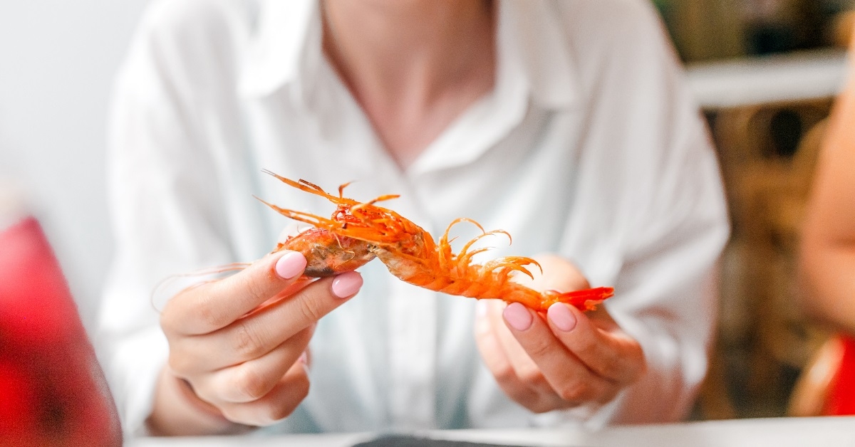 woman eating Spanish cuisine