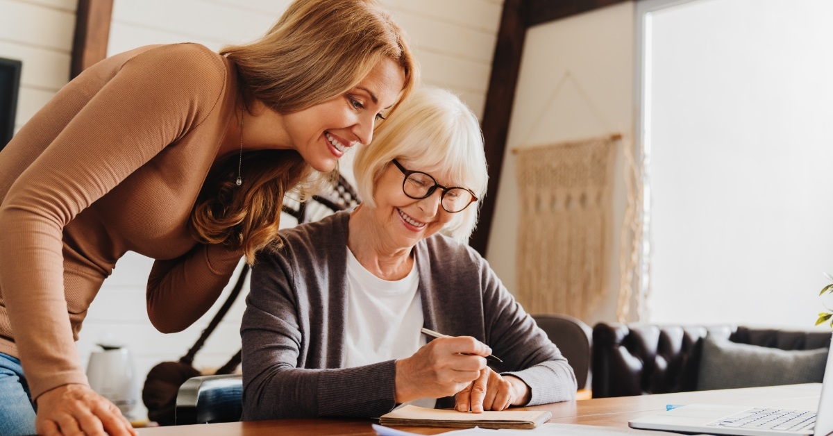 senior woman consulting female investor