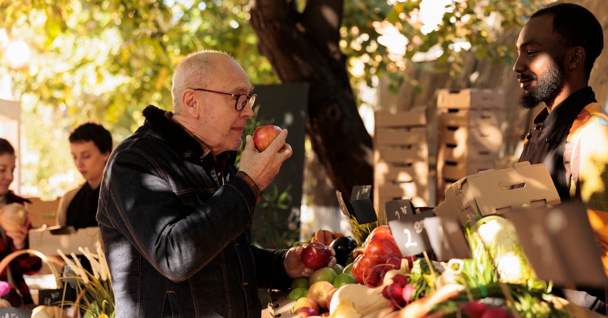 elderly client smelling apples