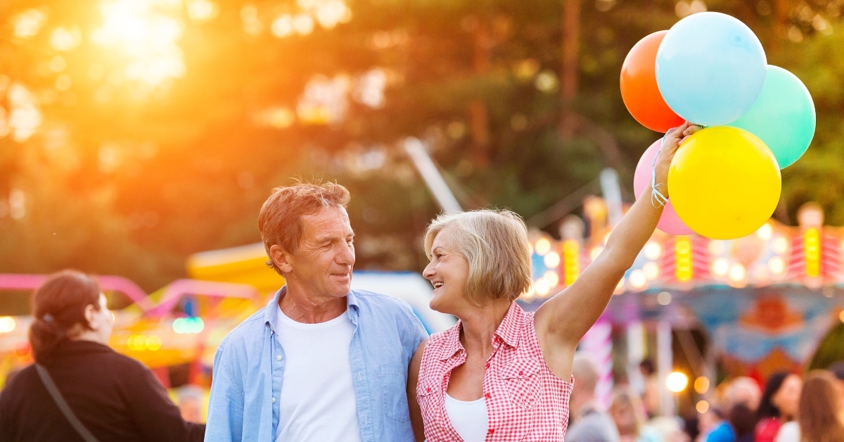 senior couple at the fun fair