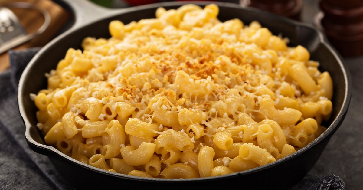 mac and cheese in a cast iron pan