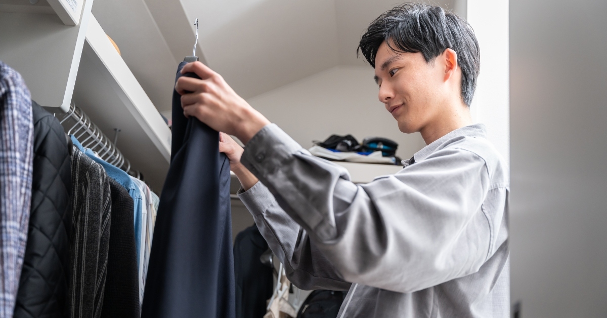 teenage boy choosing pants
