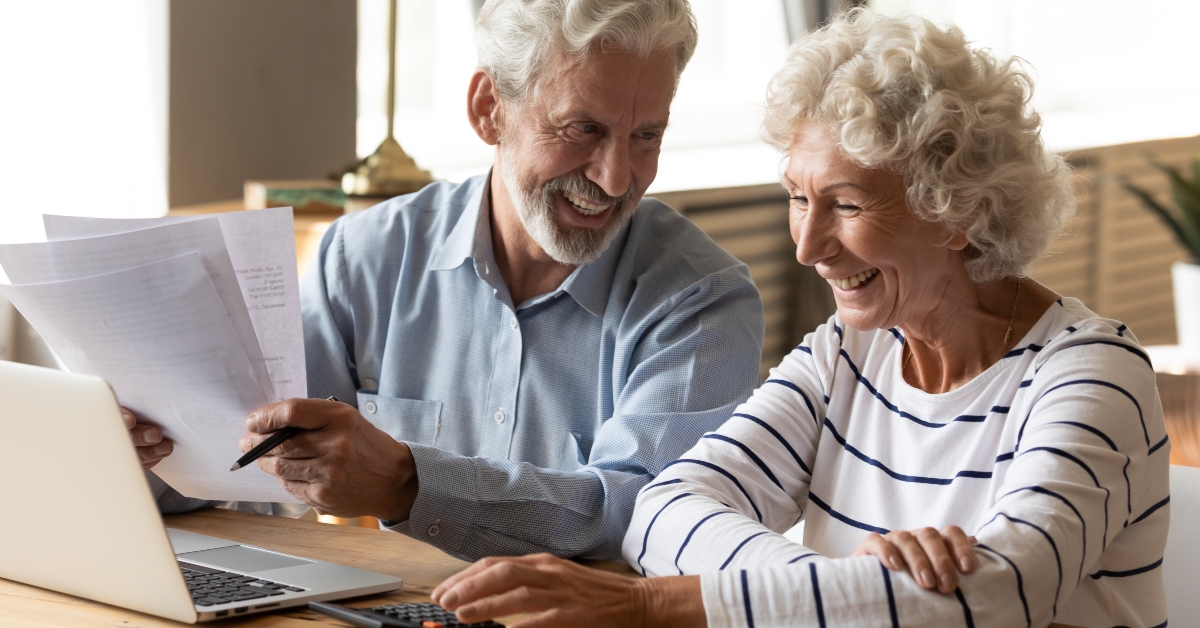 married couple managing monthly budget