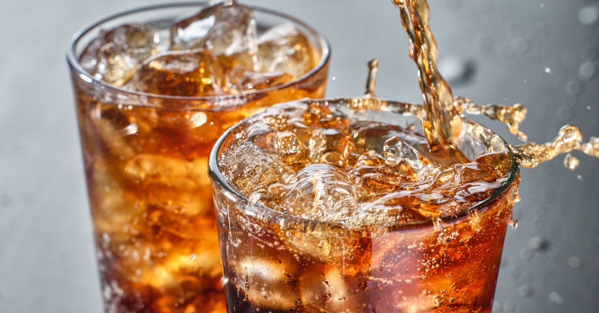 two cups of cola soft drink