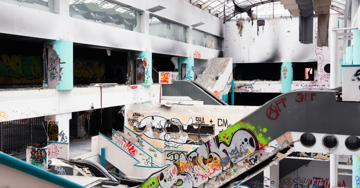 abandoned shopping mall with graffiti walls