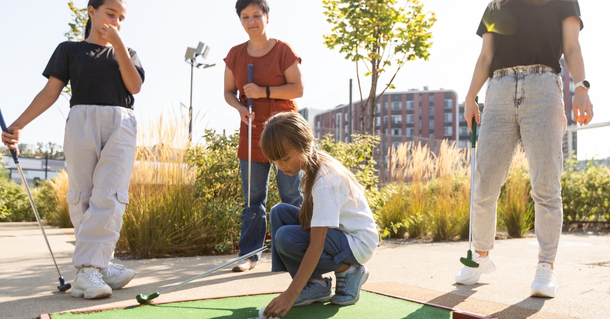 playing mini golf with family